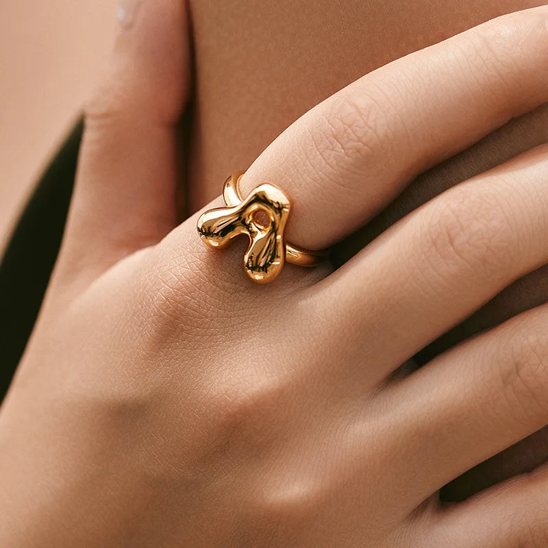 Adjustable personalized ring with initial a