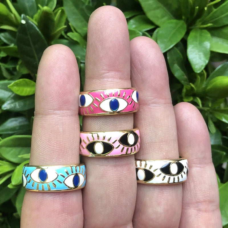 Adjustable enamel ring with gold and blue blue eye motifs
