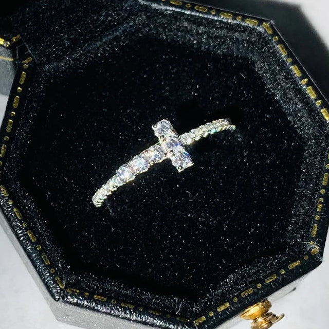 Ring with sparkling cross