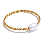 Ring with gold freshwater pearl