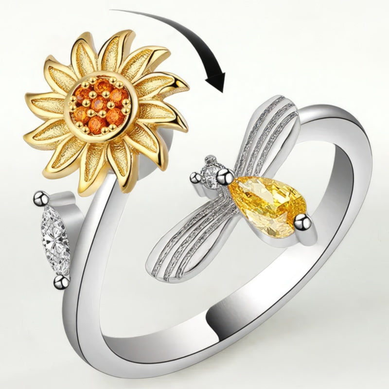 Rotating and anti-stress ring with bee and flower 
