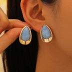 Earrings with a blue teardrop silhouette 