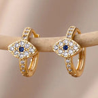 Blue evil eye hoop earrings embellished with rhinestones