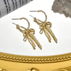 Drop earrings with bow tie