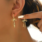 Drop earrings with bow tie