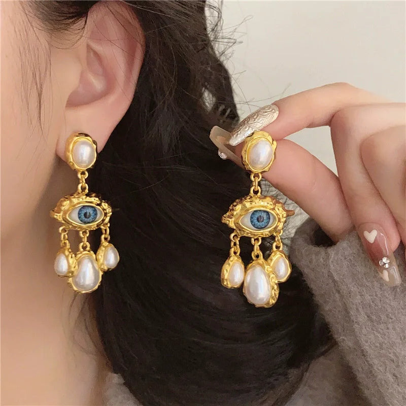 Boucles d'Oreilles Pendantes Oeil Bleu et Perles or