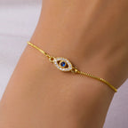 Adjustable blue evil eye bracelet embellished with rhinestones