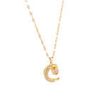 Necklace with "Celestial Eclipse" crescent moon pendant and rhinestones