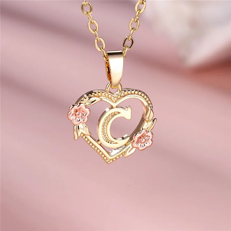 Necklace with heart and flowers initial pendant c