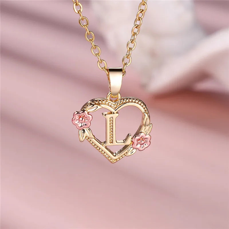Necklace with heart and flowers initial pendant l