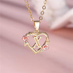 Necklace with heart and flowers initial pendant x
