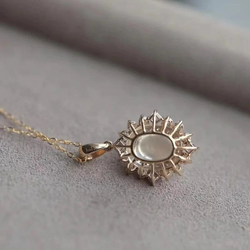 Necklace with oval moonstone pendant and sparkling crystals