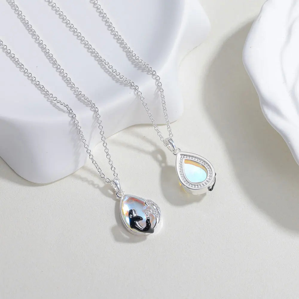 Necklace with orca and wave moonstone pendant
