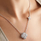 Necklace with clover pendant paved with white crystals