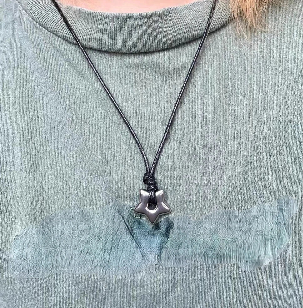 Cord necklace with hollow star pendant
