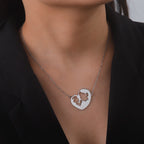 Necklace and its "mother and her baby" pendant