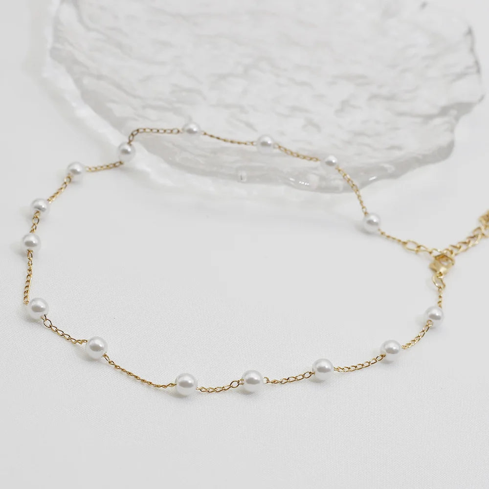 Naiste kaelakee pärlitega kuldne choker